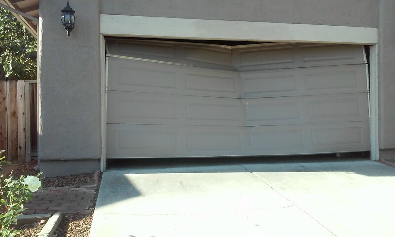 Damaged Pan Garage Door