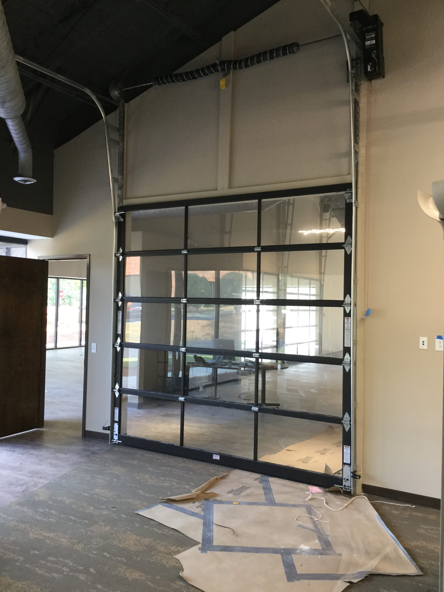 Glass Overhead Doors Installed In Office Norcross GA | Frosted Glass