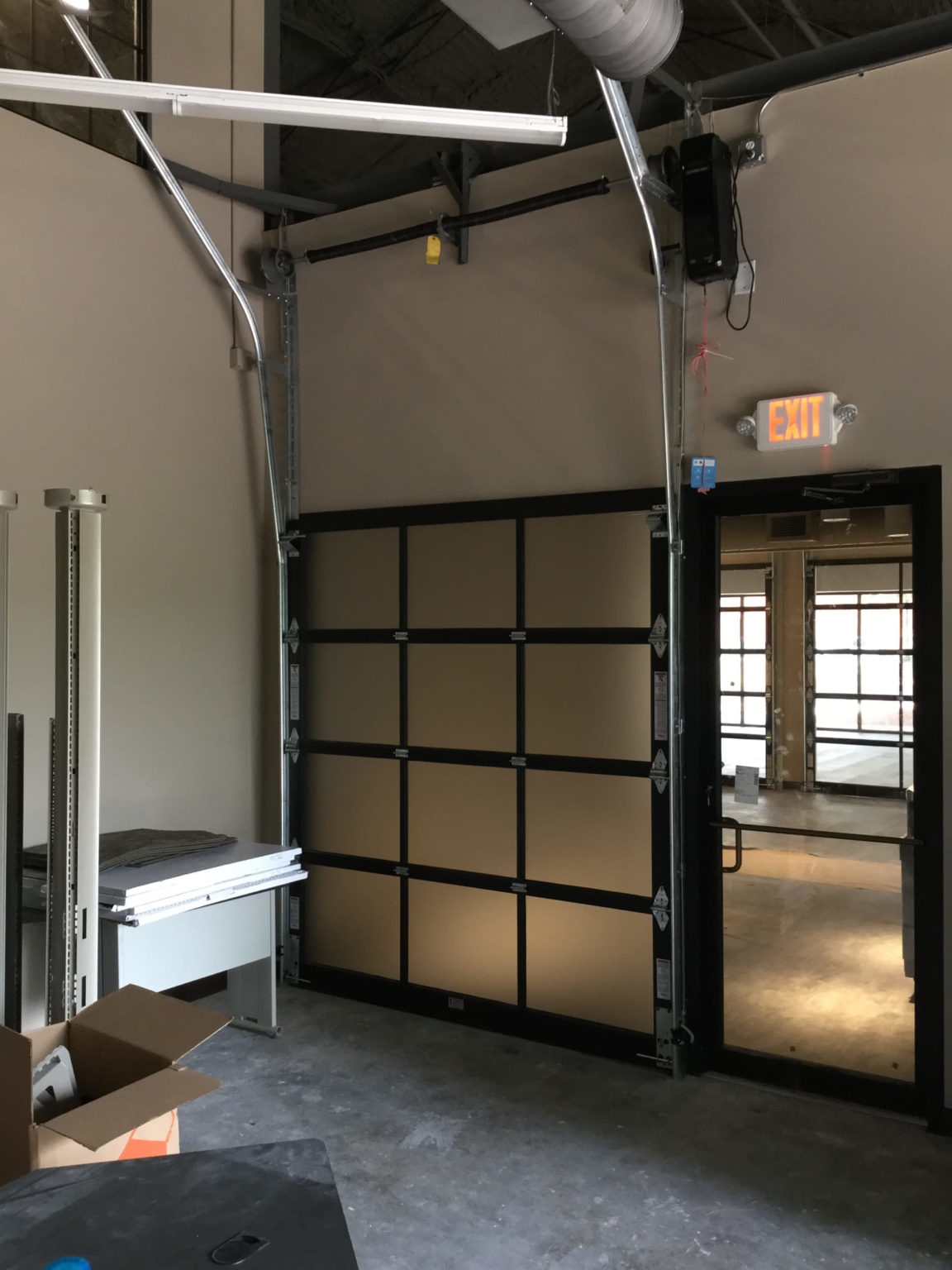 Glass Overhead Doors Installed In Office Norcross GA Frosted Glass 