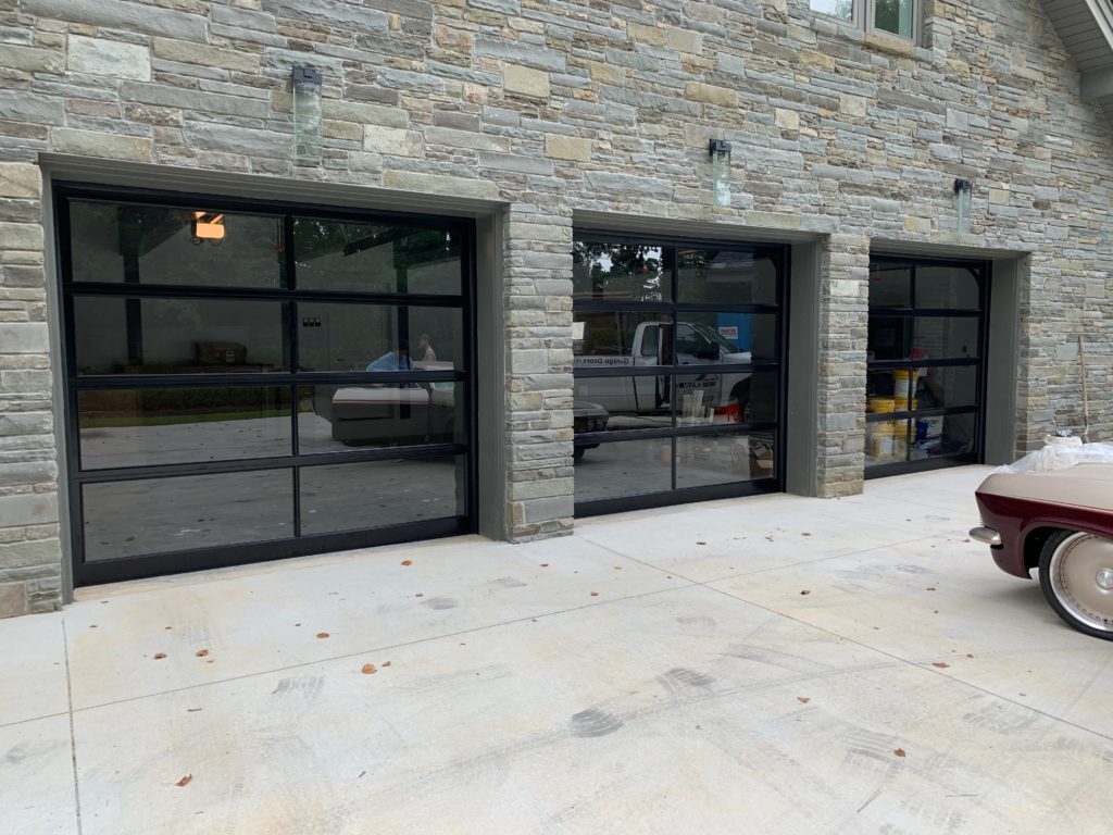 Black frame glass garage doors